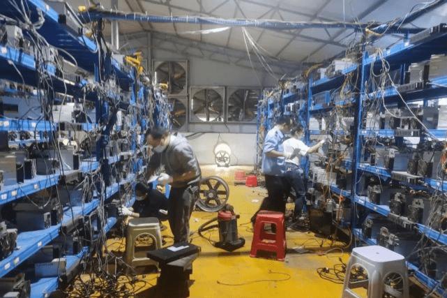 Vast cryptocurrency mining farm with rows of mining machines